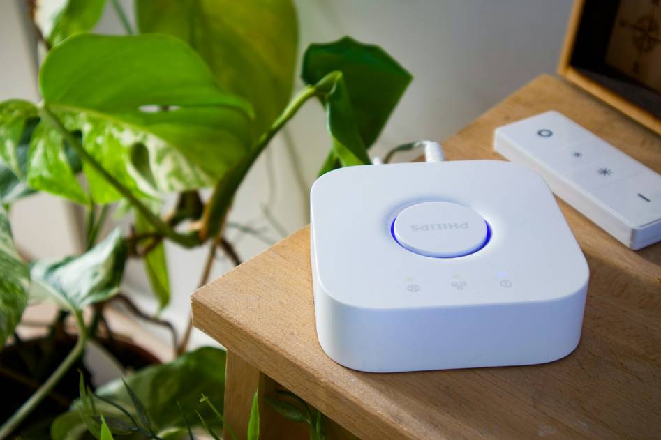 Modern smart home living room with automated lighting and voice assistant